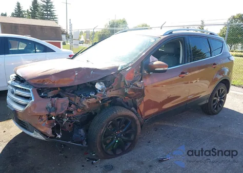 2017 Ford Escape Titanium из США, поврежденный, VIN 1FMCU9JD2HUB13472